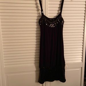 NWT Beautiful dress trimmed with sequined top and bottom!